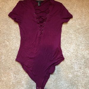 cross front magenta bodysuit